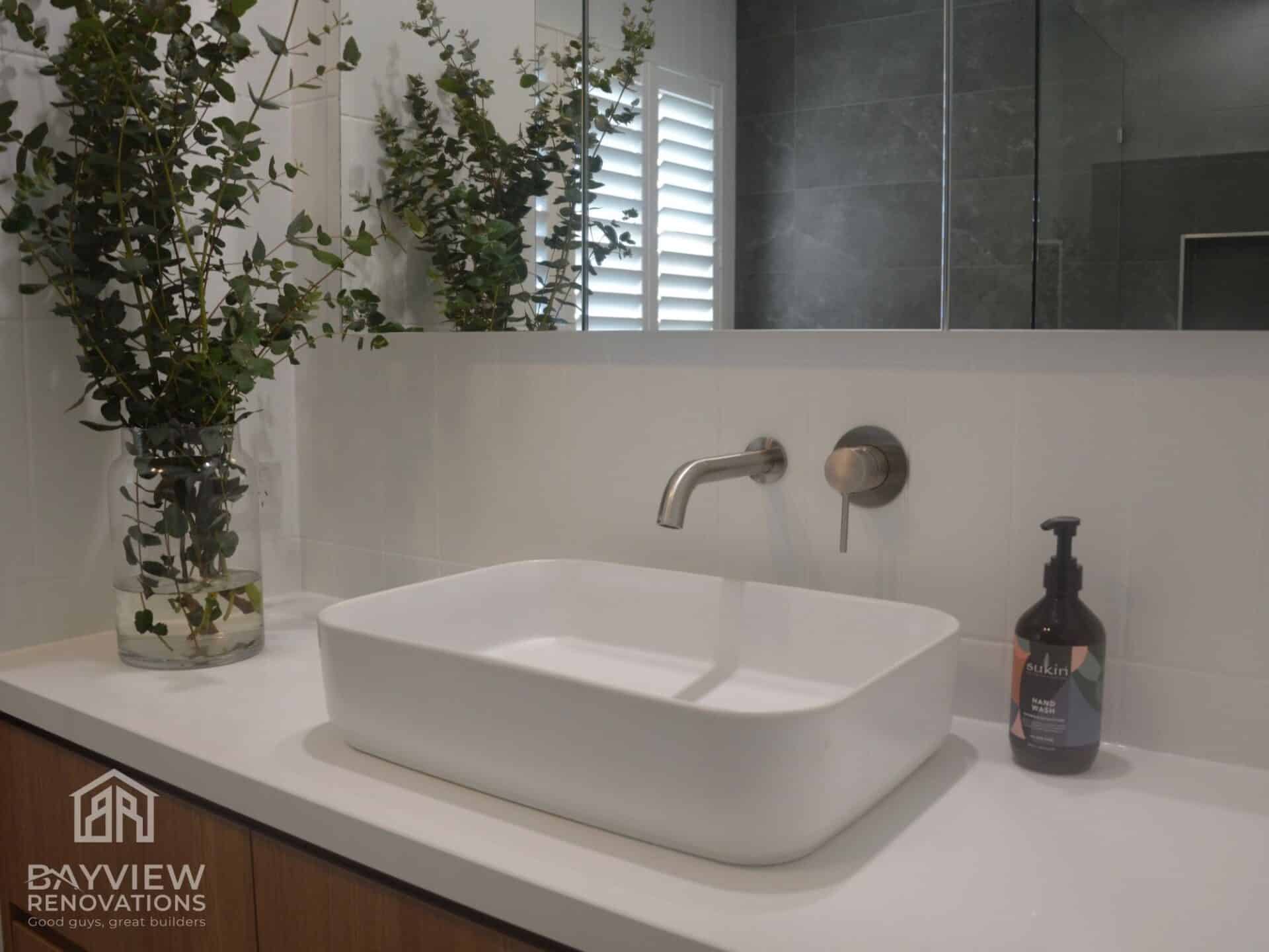 Mount Eliza Main Bathroom Renovation with a sink and a bottle of soap on a counter
