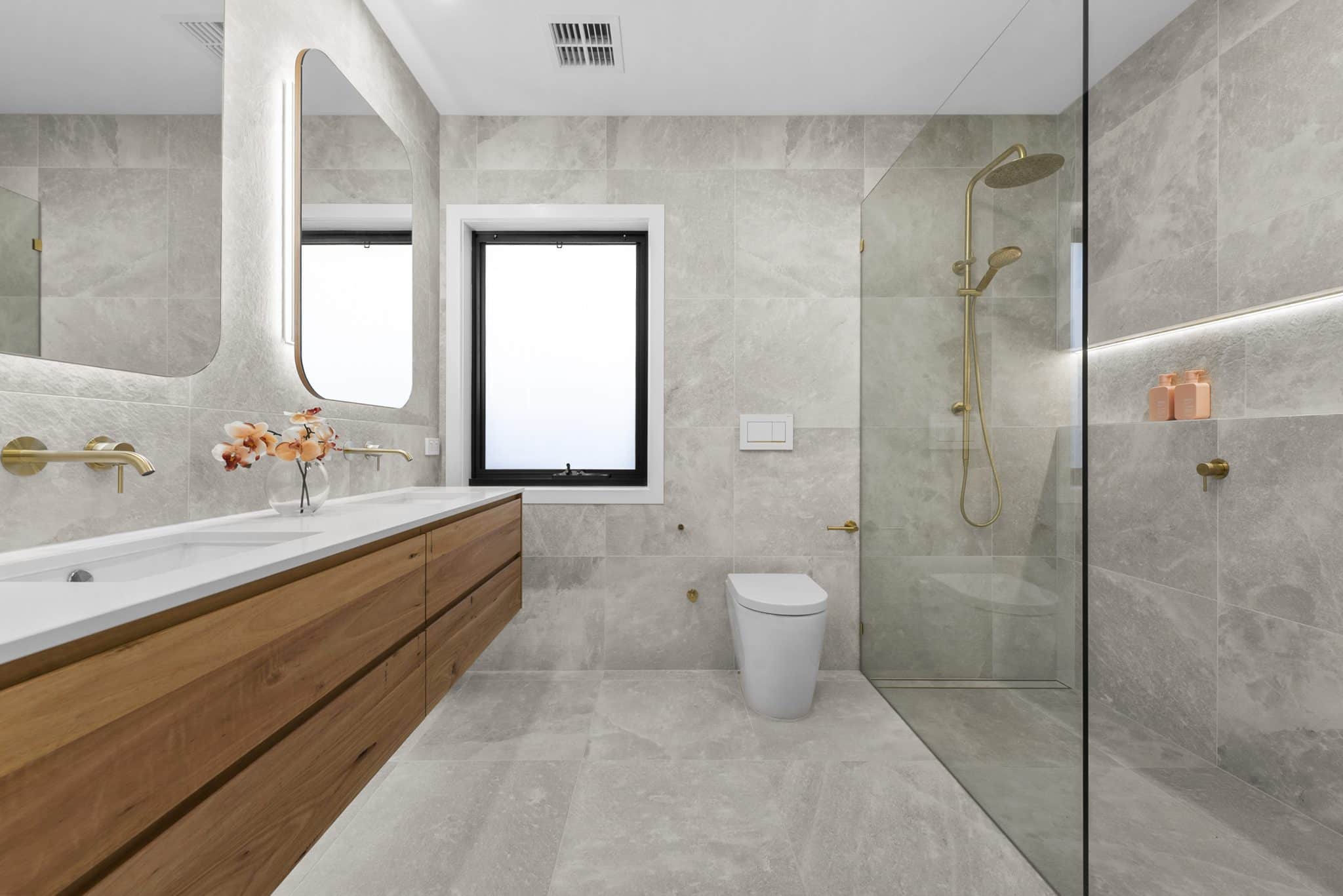 beaumaris bathroom makeover with double sink and brass tapware