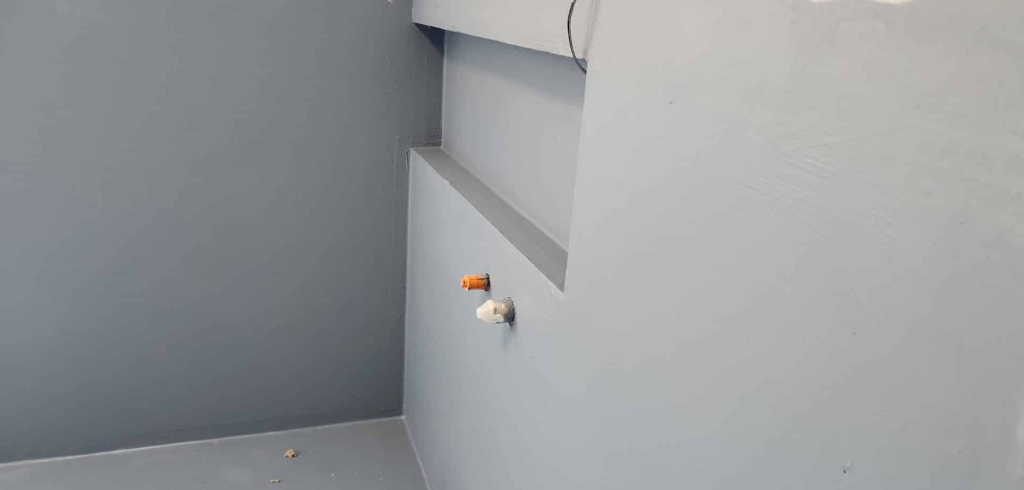 a photo of a bathroom renovation showing a waterproofing coating